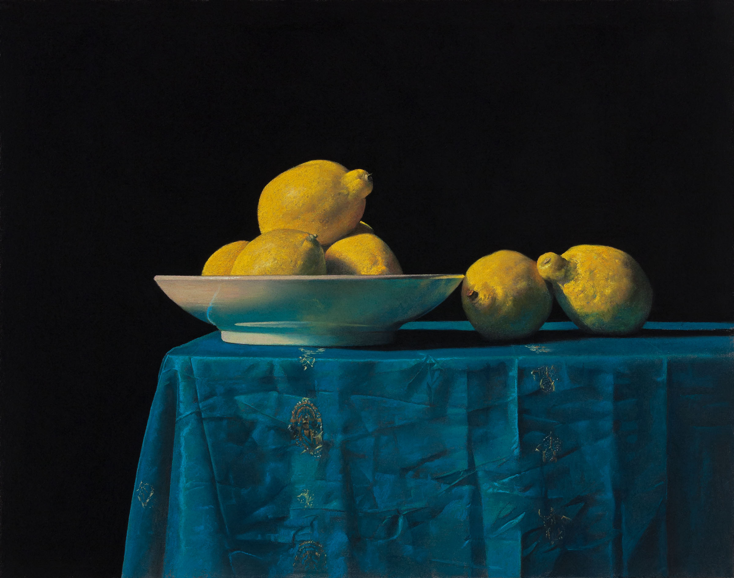 lemons on a blue tablecloth